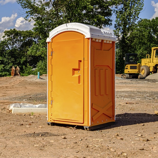 how often are the portable restrooms cleaned and serviced during a rental period in Arcanum Ohio